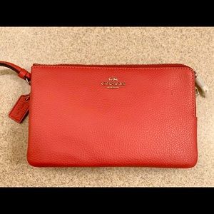 Coach Pink Wallet handbag.